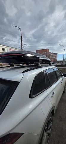 ENROAD на Geely Monjaro: автобокс ENROAD Nomadix Pro XL Slim 400-E, цвет «Чёрный» — дополнительный ракурс автомобиля с установленным автобоксом