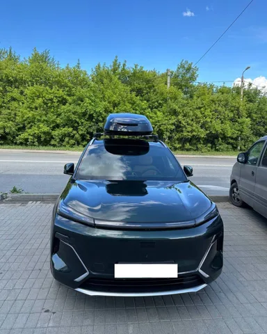 Чёрный автобокс ENROAD Nomadix Pro XL 500-E на Geely EX5 EM-i — общий вид автомобиля с установленным автобоксом