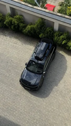 Чёрный автобокс ENROAD Nomadix Pro XL Slim 400-E на Lixiang L9 — вид автомобиля с установленным автобоксом, другой ракурс